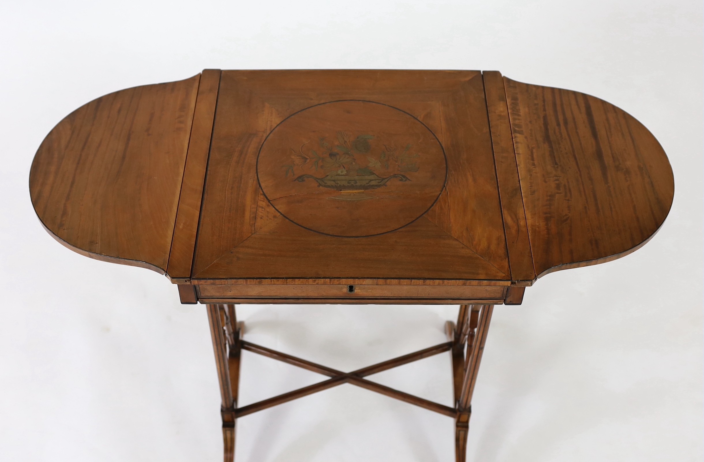 An Edwardian marquetry inlaid satinwood occasional table